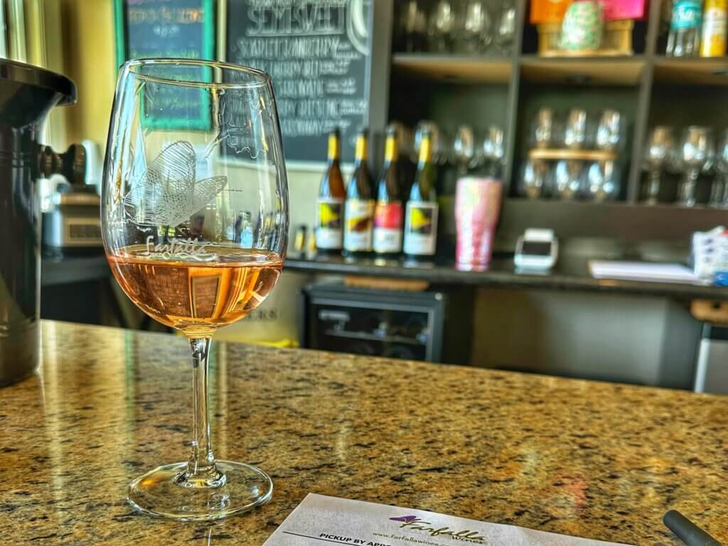 Wine glass at the bar in the tasting room